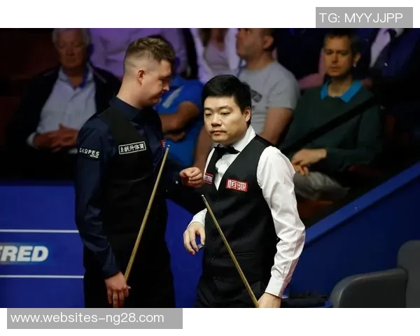 丁俊晖与威尔逊精彩对决比分揭晓胜负悬念引发球迷热议 丁俊晖与威尔逊精彩对决比分揭晓胜负悬念引发球迷热议